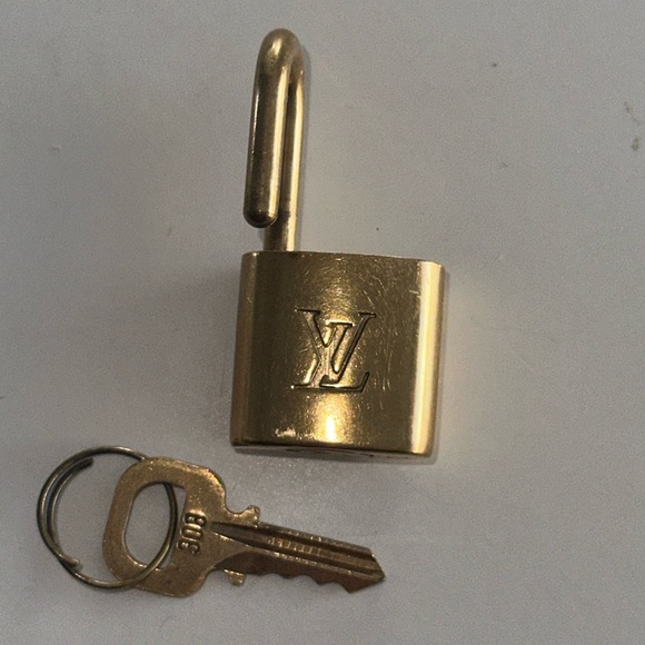 Louis Vuitton Other - LOUIS VUITTON LOCK N KEY 303